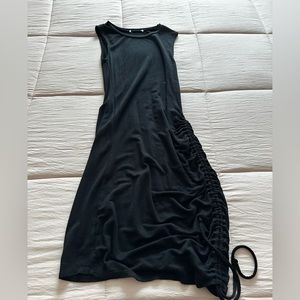 Black bodycon mini dress with rouche detail